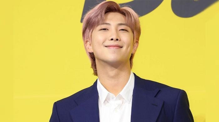 BTS RM treats fans with surprise appearance after historic win